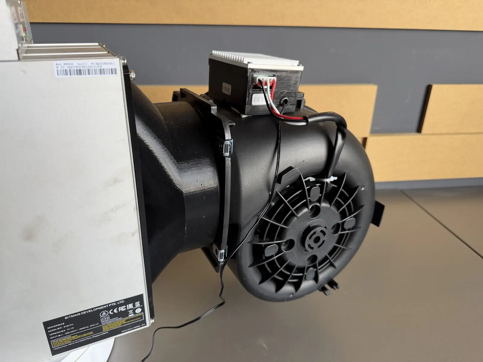 Close-up of ASIC Miner Silencer Gen2 connected to an Antminer